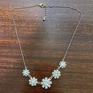 Golden flower charm necklace